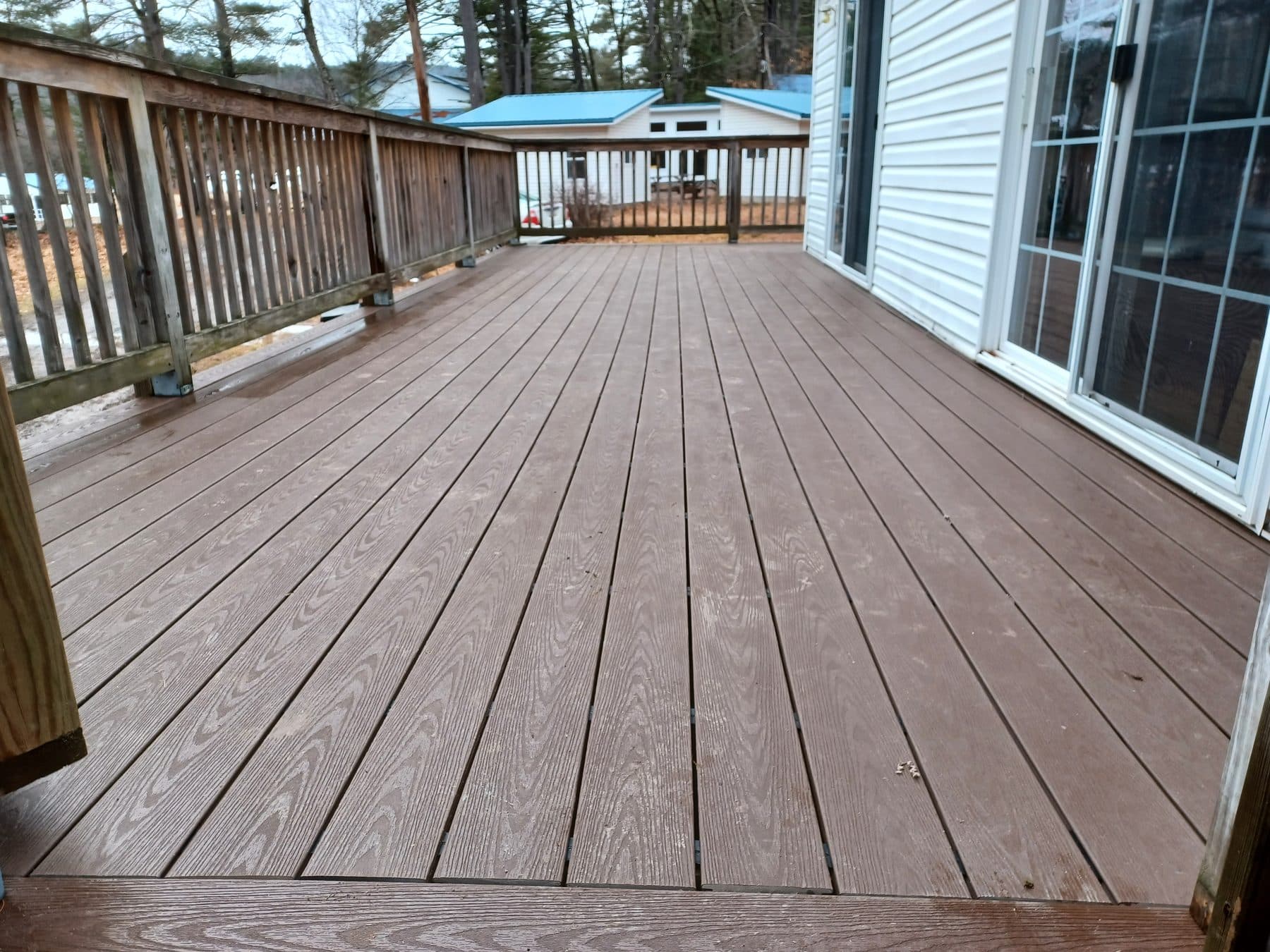 Deck resurfaced with new composite boards on the existing frame