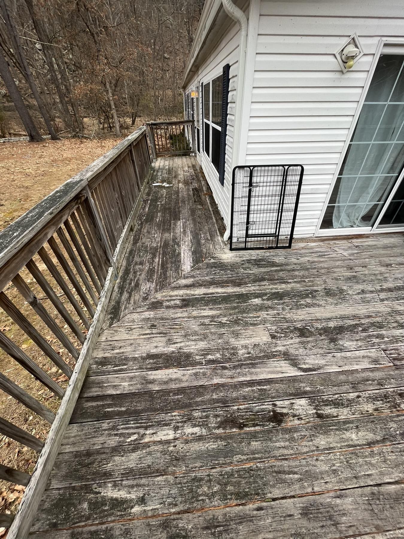 Weathered wood deck before replacement