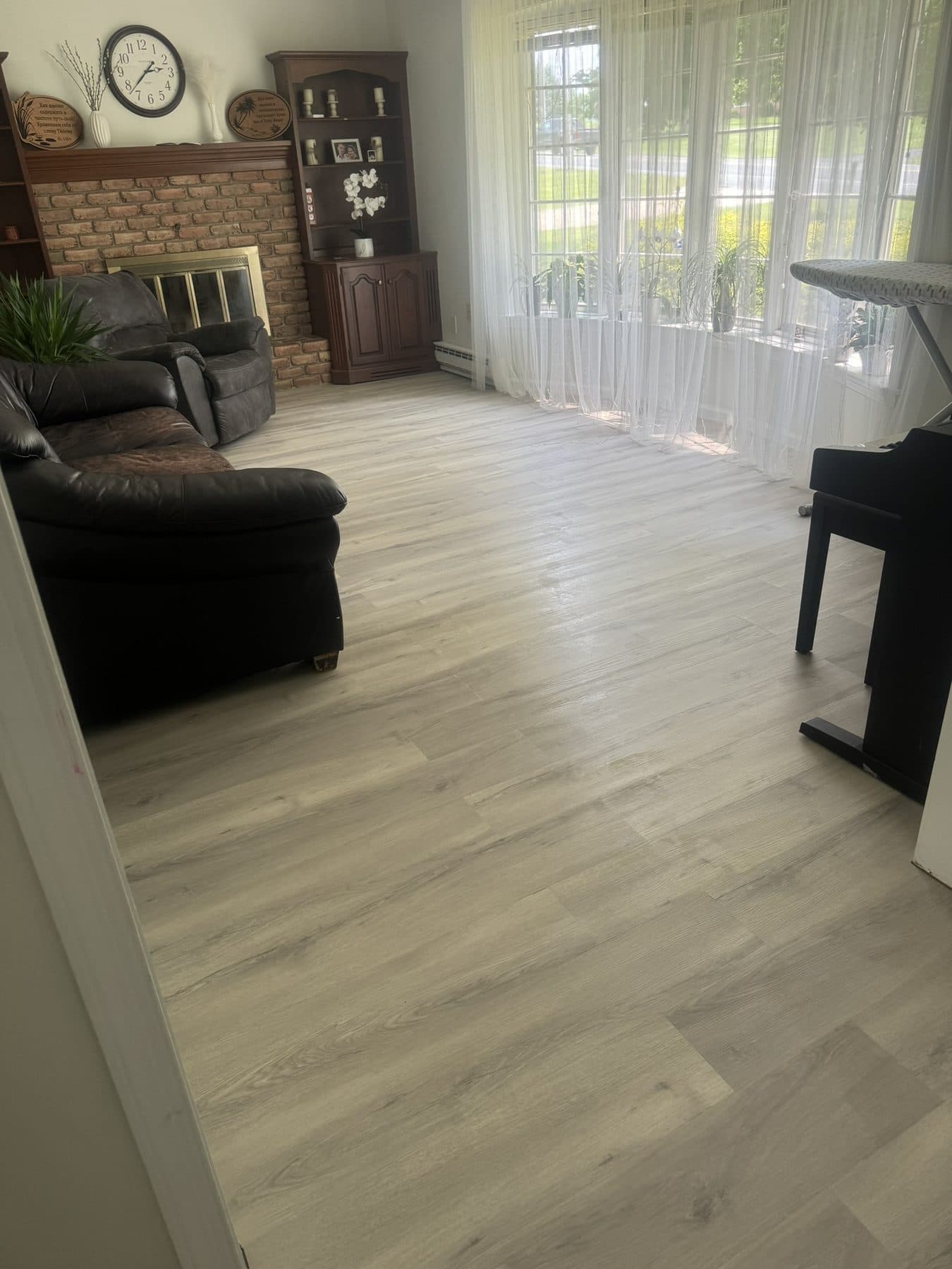 Living room with new light LVP plank flooring in Heidelberg Township